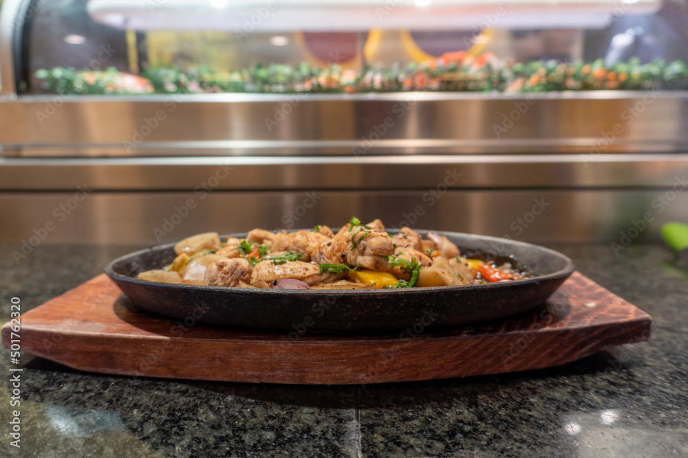 Combination of beef fillet and grilled vegetables, accompanied by vegetable Yakimeshi. Teppanyaki.