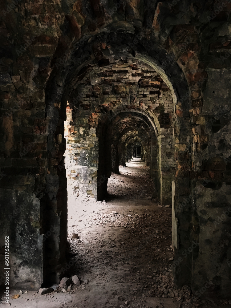 Fototapeta premium Tarakaniv fortress/ Ukraine-Sep 27 2019: Tarakaniv fortress in autumn. Historical landmark with ruins of old brick fort bastille. Sightseeing in the neighborhood. Tourist attraction.