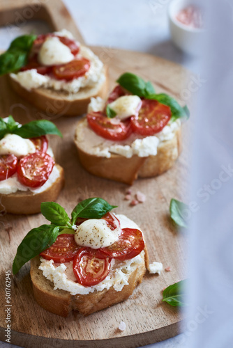 bruschetta sandwiches with cheese and basil