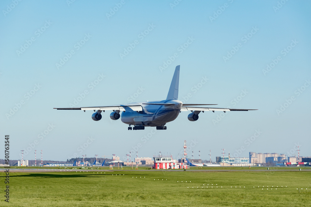 Landing of the big cargo airliner in the airport. Landing of the big cargo airliner in the airport.
