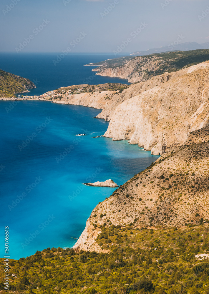 Assos coast against azure water of the Ionian Sea, Kefalonia, Greece