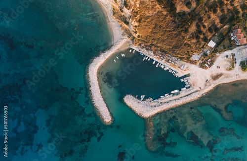 Katelios harbor aerial view against azure water, Kefalonia, Greece