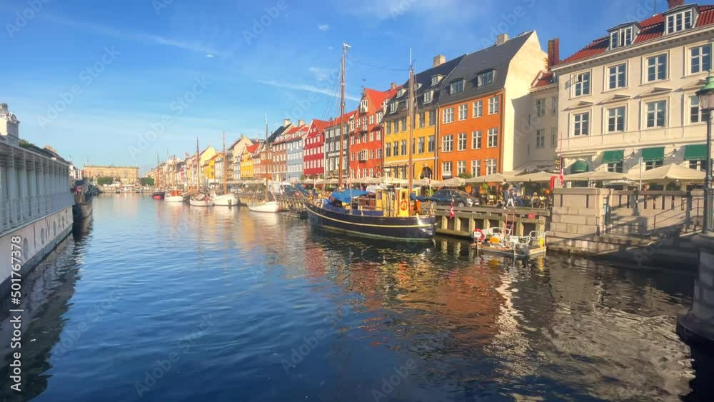 Nyhavn canal with boats, ships and many small colorful houses. Copenhagen, Denmark Nyhavn canal with boats, ships and many small colorful houses. Copenhagen, Denmark