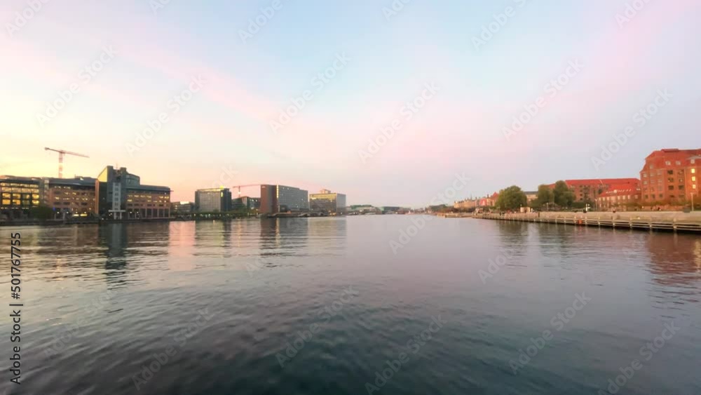Port of Copenhagen and different houses on the embankment at sunset. Denmark Port of Copenhagen and different houses on the embankment at sunset. Denmark