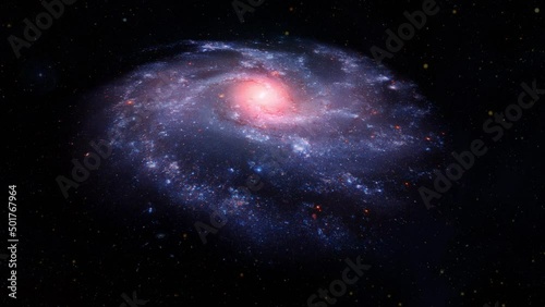 The galaxy rotates in the depths of space