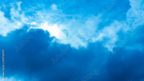 Rain cloud and sun beam. Panorama of cloudy gray sky. Abstract textured. Rain clouds background. Space for text.