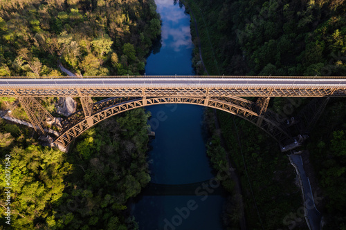San Michele bridge over Adda river aerial view.