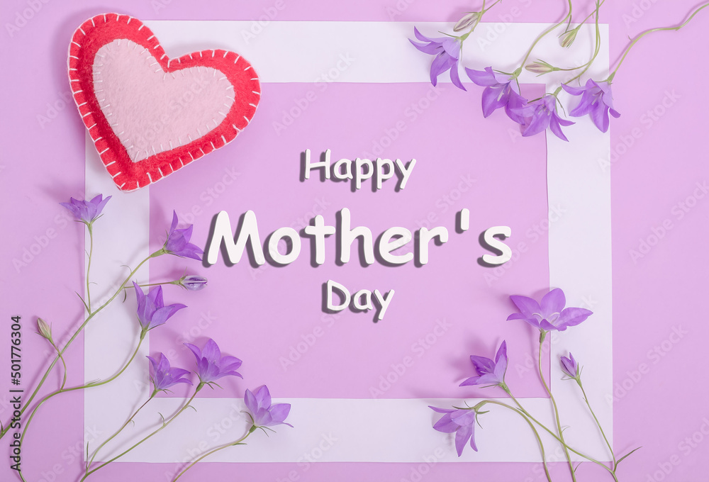 Happy Mother's Day lettering with delicate lilac bells and a heart on a lilac background
