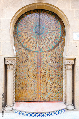 Door of a building in Kasbah of the Udayas in Rabat, Morocco photo