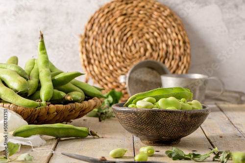 Fresh and raw green broad beans photo