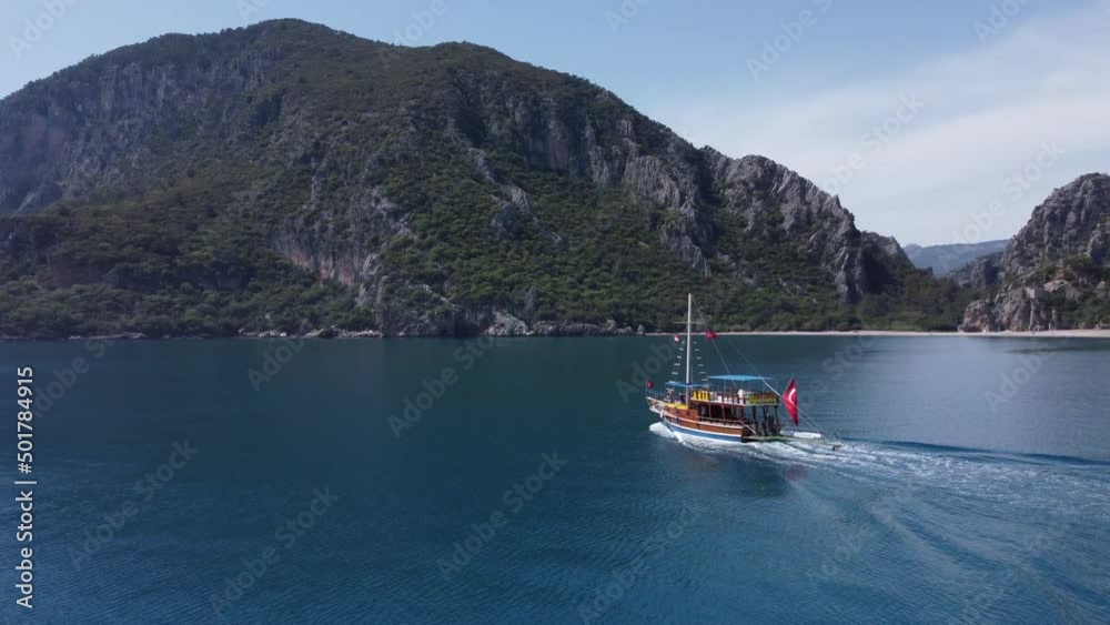 Point of interest flyby, aerial view, camping tourist boat on a sunny day, Antalya, Mediterranean sea, holidays and vacations, calm sea, fly around pirate ship. High quality 4k footage Point of interest flyby, aerial view, camping tourist boat on a sunny day, Antalya, Mediterranean sea, holidays and vacations, calm sea, fly around pirate ship. High quality 4k footage