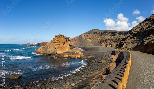 Obraz na płótnie Pedestrian path leading to the famous Green lake, El Lago Verde on the island of Lanzarote w salonie