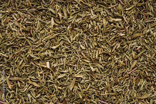 fragrant dried thyme on a white acrylic background