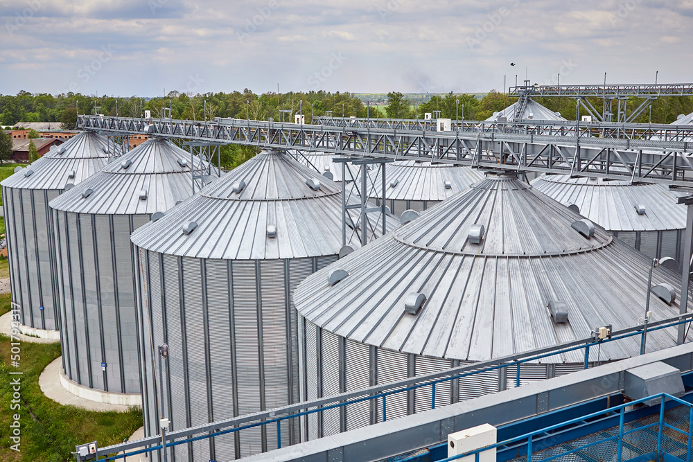 Metal elevator (grain silo) in agriculture zone. Grain Warehouse or