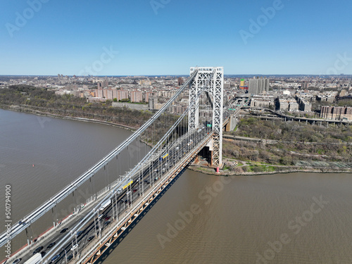 Aerial view of George Washington Bridge in Fort Lee, NJ. George Washington Bridge is a suspension bridge spanning the Hudson River connecting NJ to Manhattan.