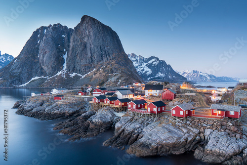 Traditional Norwegian fisherman s cabins, rorbuer, on the island of Hamnøy, Reine on the Lofoten in northern Norway. Photographed at dawn in winter.