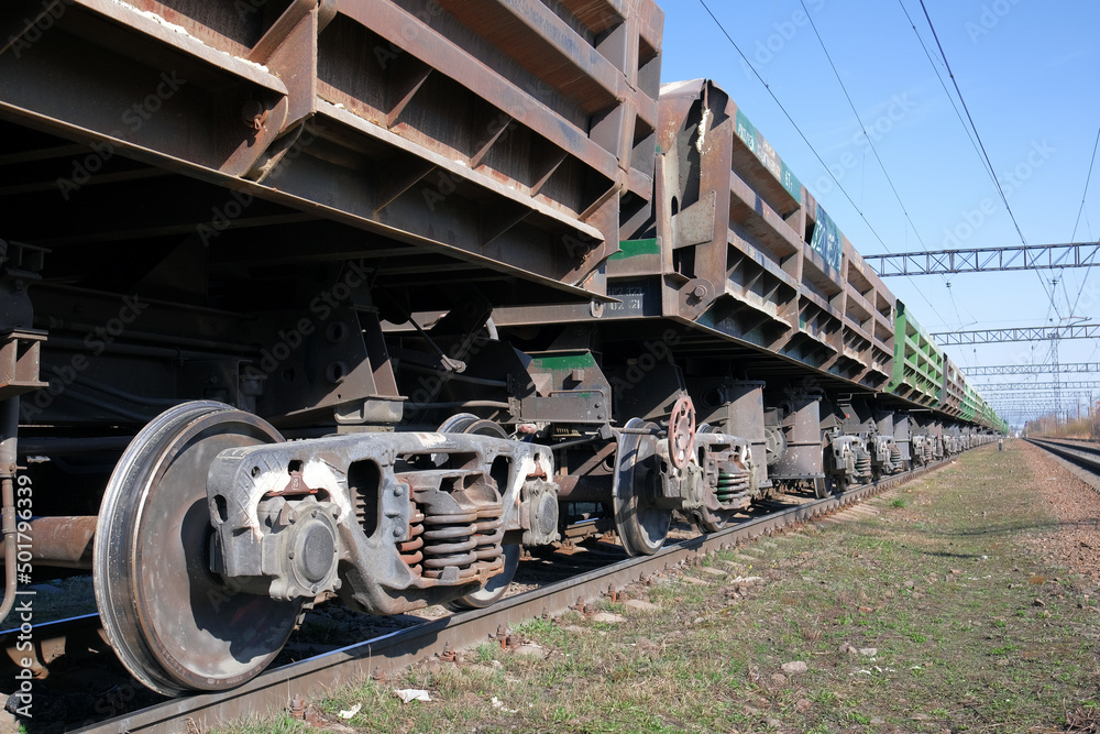 Naklejka premium The Russian armed Forces are conducting a special military operation. Cargo train, cargo platforms for transportation of military equipment.
