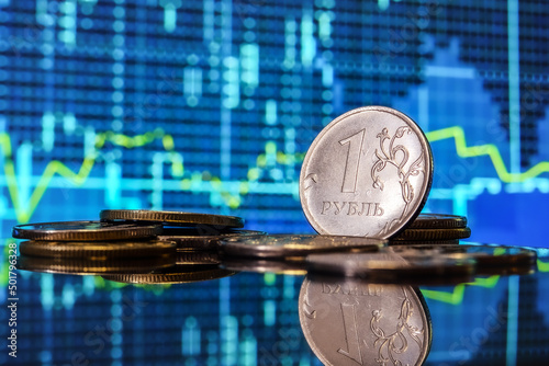 Background, blur, out of focus, bokeh, pasteurization. Coins of the Russian ruble. The rise of the ruble exchange rate. Payment for gas in Russian currency.