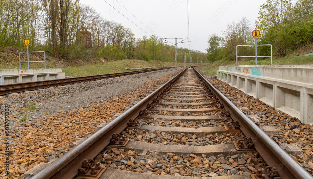 Fototapeta premium Railway track at a platform Station