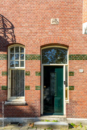 Fototapeta Naklejka Na Ścianę i Meble -  Typical dutch architectural detail, a door in Rotterdam