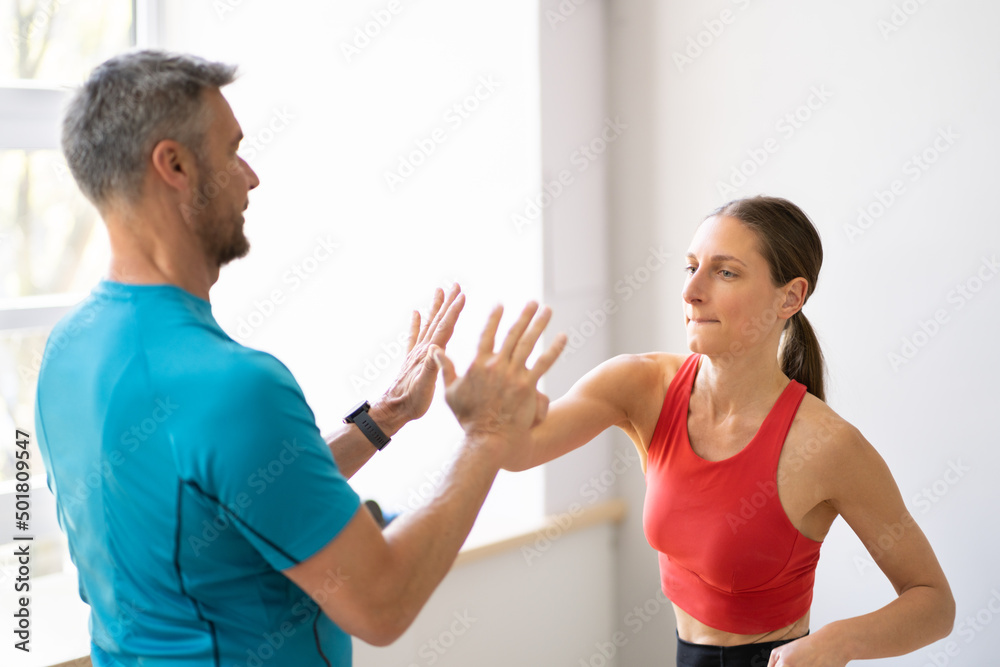 Fight Sparring Fitness Training In Gym. Female Power Fight Sparring Fitness Training In Gym. Female Power