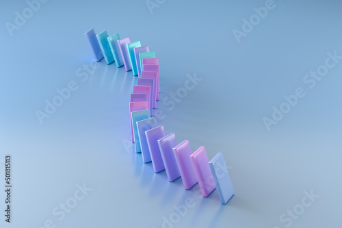 Spiral of Multicolored Dominoes on a Blue Table. 3d Rendering photo