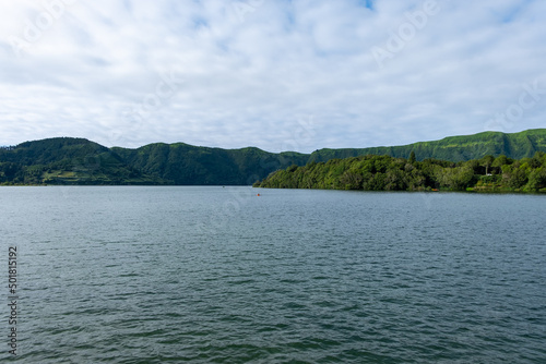 Amazing View over the Seven Cities Lake "Lagoa das Sete Cidades" with green mountain in the background, São Miguel Island in the Azores, Portugal © Vitor Miranda