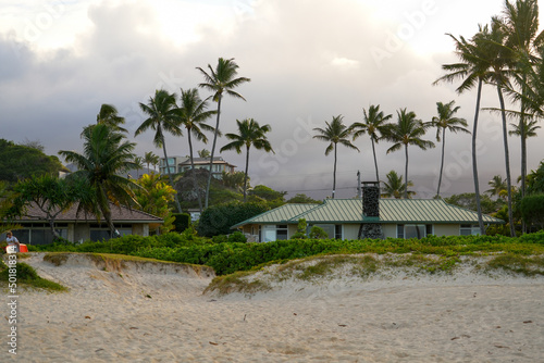 Stormy weather over an ocean front house on Lanikai Beach in Kailua, on the eastern side of Oahu in Hawaii, United States