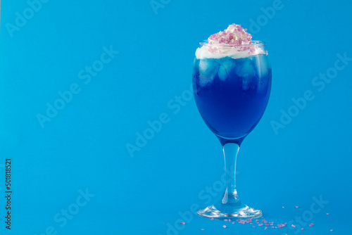 Blue Cocktail with Ice and Whipped Cream