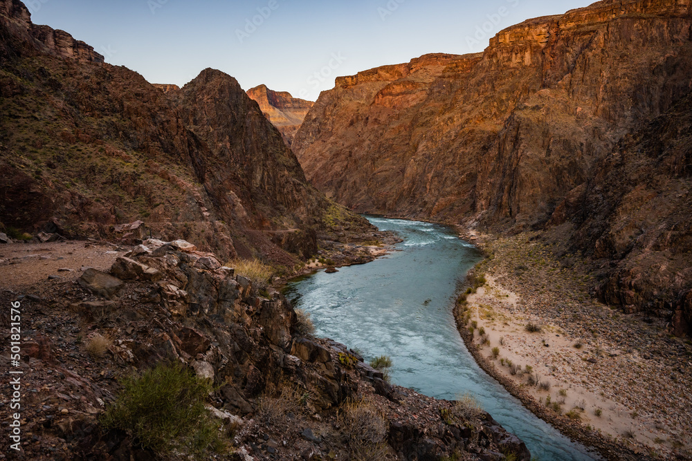 Colorado River Snakes Through The Grand Canyon In Morning Light