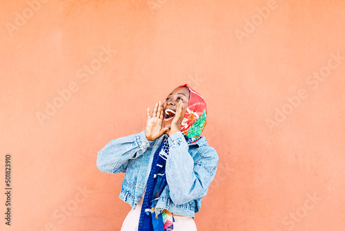 young black attractive girl screaming, shoutout photo