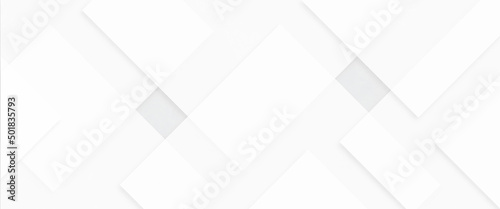 Abstract white background with diamond and triangle shapes layered in modern abstract pattern white background. geometric lines angles shapes in white and gray layers of transparent material. 