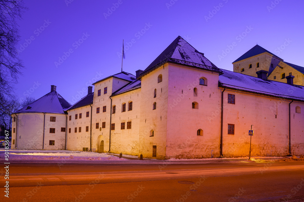 February evening at the entrance to the medieval castle of Abo. Turku, Finland