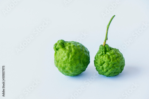Two fresh kaffir lime fruits photo