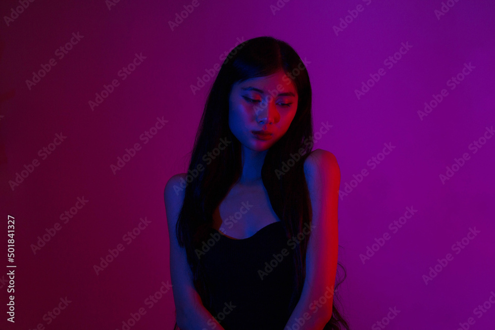 Fashion and beauty concept, Fashion woman with glitter makeup to posing on neon light background