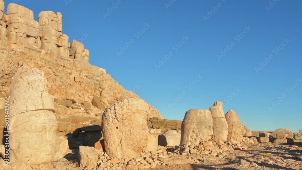Static view Statues on top of the Nemrut Mountain in Adiyaman, Turkey. Morning sunrise east side Nemrut Dagi Static view Statues on top of the Nemrut Mountain in Adiyaman, Turkey. Morning sunrise east side Nemrut Dagi