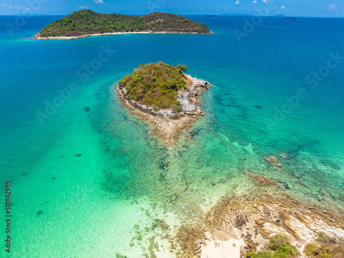 Aerial view of beautiful landscape cliff island beach with green mountain view at Koh Si Chang island Chon Buri Province, Thailand.