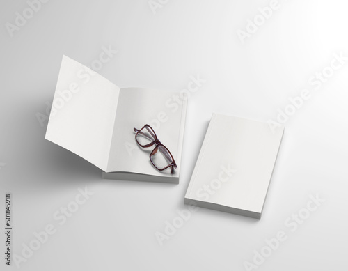 Plain white blank A5 open and close book cover and inside on isolated background 