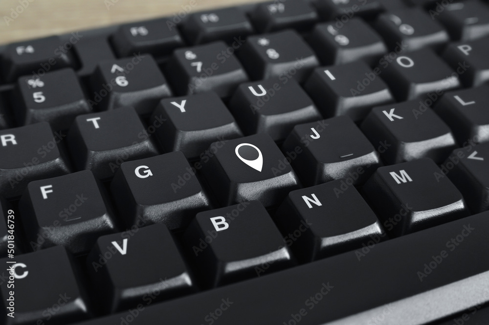 Map pin point location icon on black computer keyboard button, Map pointer navigation online concept Map pin point location icon on black computer keyboard button, Map pointer navigation online concept