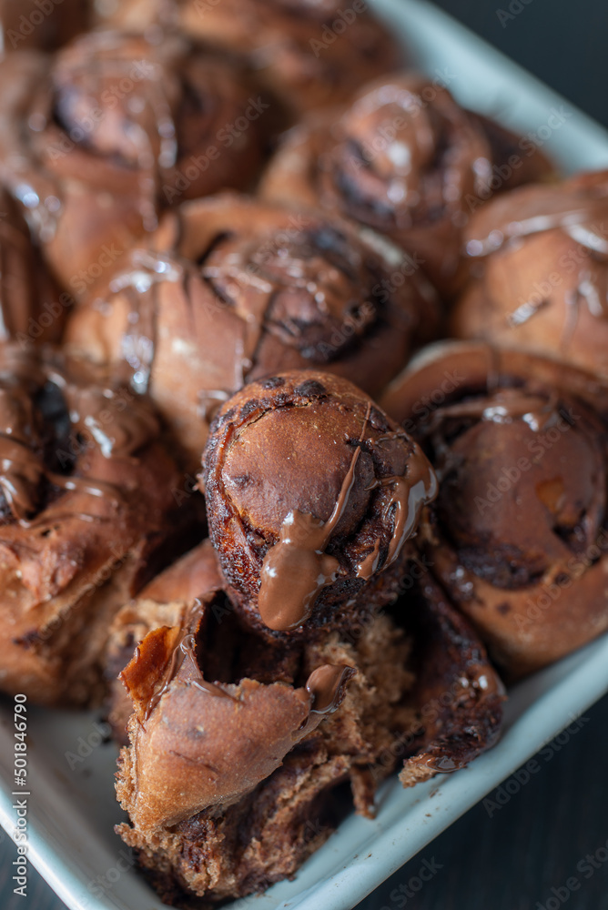 sweet home made chocolate cinnamon rolls on a table sweet home made chocolate cinnamon rolls on a table