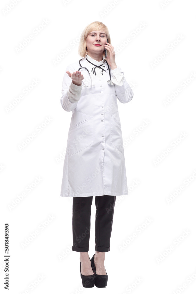 qualified female doctor with a smartphone in her hands. qualified female doctor with a smartphone in her hands.