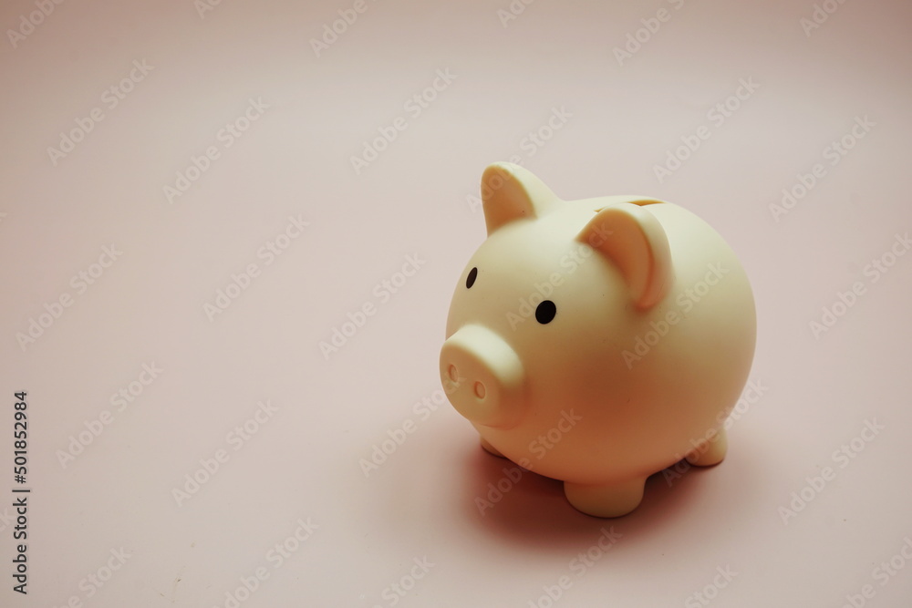 Piggy banks saving with space copy on pink background Piggy banks saving with space copy on pink background