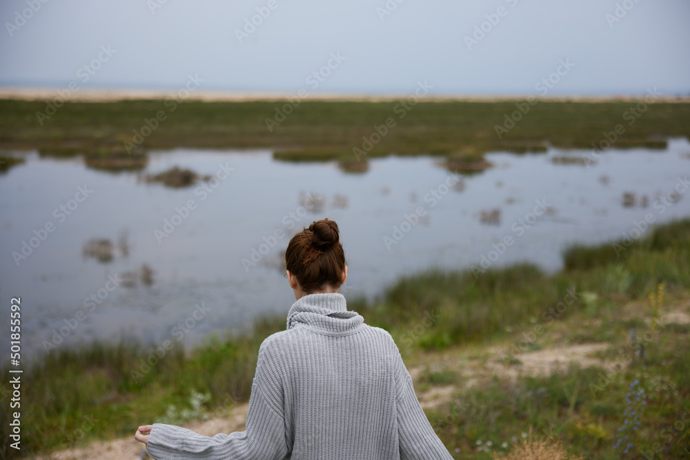Fototapeta premium woman outdoors lake walk travel landscape
