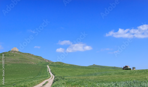 Basilicata landscape: the Norman castle of Monteserico. Near town of Genzano di Lucania, it is for the construction phases that characterize it, an example of medieval architecture in Italy. photo