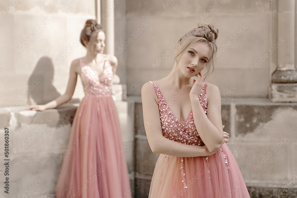 European girls bridesmaids in pink dresses having fun