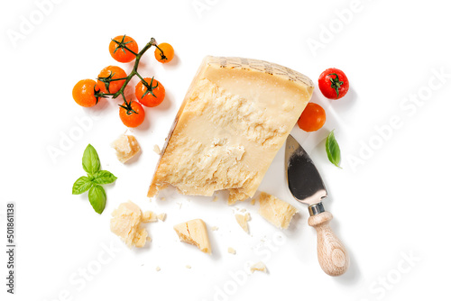 Piece of Parmesan cheese with cherry tomatoes and fresh basil leaves  isolated on white background, top view