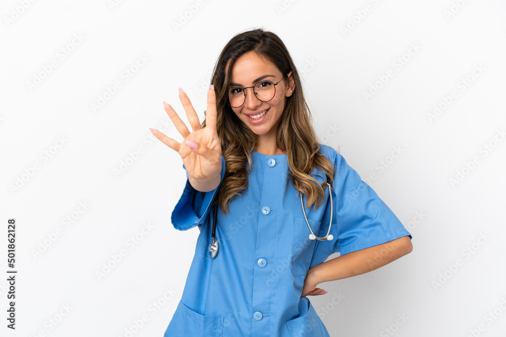 Young surgeon doctor woman over isolated white wall happy and counting four with fingers Young surgeon doctor woman over isolated white wall happy and counting four with fingers