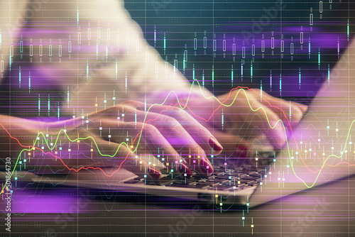 Double exposure of businesswoman hands typing on computer and forex chart hologram drawing. Financial analysis concept.