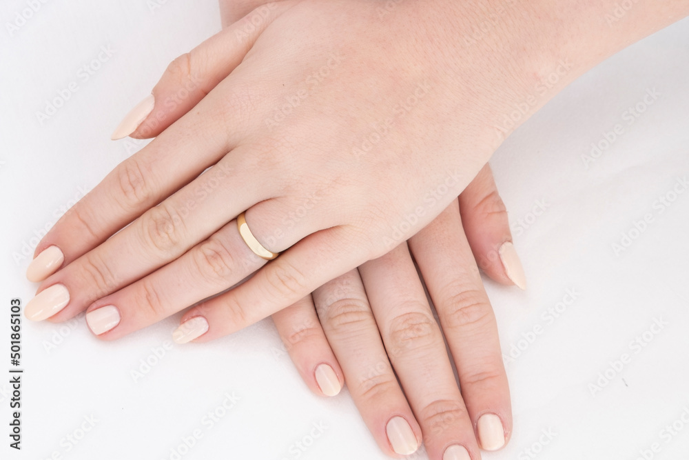 Close-up of elegant diamond ring on female finger. Love and wedding concept.Soft and selective focus. Close-up of elegant diamond ring on female finger. Love and wedding concept.Soft and selective focus.