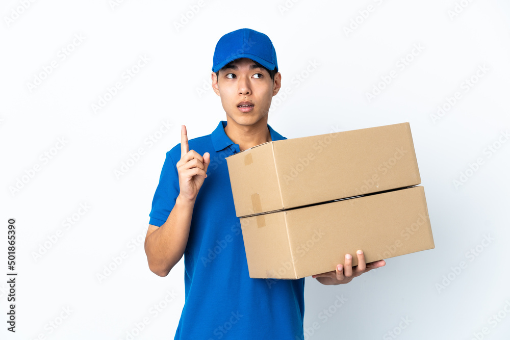 Delivery Chinese man isolated on white background thinking an idea pointing the finger up Delivery Chinese man isolated on white background thinking an idea pointing the finger up